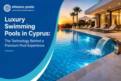 Luxury swimming pool in Cyprus featuring a modern villa, illuminated pool, elegant waterfall feature, and premium resort-style surroundings.